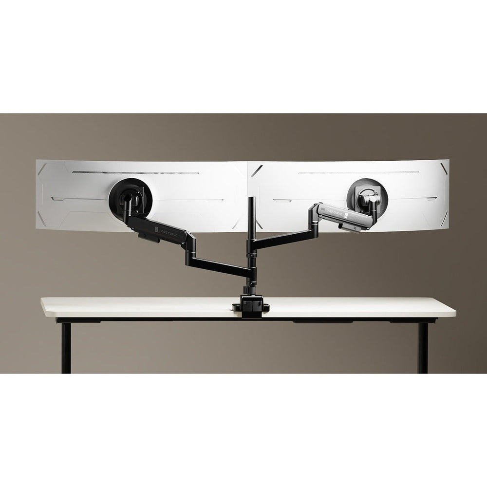Thinking Works 2:22 Curve dual monitor arm in matte black holding two monitors side by side